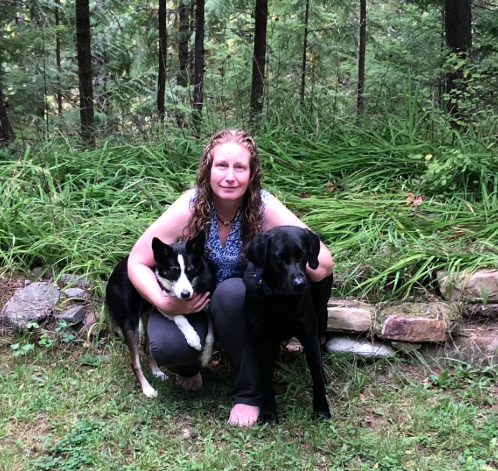 Laurie Huston with two dogs